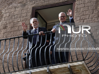 US director Francis Ford Coppola, flanked by Rome's mayor Roberto Gualtieri, admires the view from a balcony of the Capitole Palace overlook...