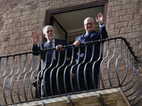 US director Francis Ford Coppola, flanked by Rome's mayor Roberto Gualtieri, admires the view from a balcony of the Capitole Palace overlook...