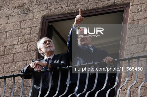 US director Francis Ford Coppola, flanked by Rome's mayor Roberto Gualtieri, admires the view from a balcony of the Capitole Palace overlook...