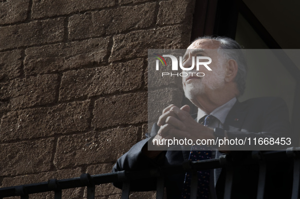 US director Francis Ford Coppola admires the view from a balcony of the Capitole Palace overlooking the Roman Forum during the 19th Rome Fil...