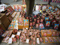 Framed Lakshmi photos are displayed for sale on the eve of the Lakshmi Puja festival in Guwahati, India, on October 15, 2024. Lakshmi is one...