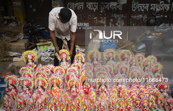 Lakshmi idols are displayed for sale on the eve of the Lakshmi Puja festival in Guwahati, India, on October 15, 2024. Laxmi is one of the mo...