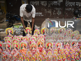 Lakshmi idols are displayed for sale on the eve of the Lakshmi Puja festival in Guwahati, India, on October 15, 2024. Laxmi is one of the mo...