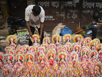 Lakshmi idols are displayed for sale on the eve of the Lakshmi Puja festival in Guwahati, India, on October 15, 2024. Laxmi is one of the mo...