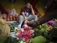 Lakshmi idols are displayed for sale on the eve of the Lakshmi Puja festival in Guwahati, India, on October 15, 2024. Laxmi is one of the mo...