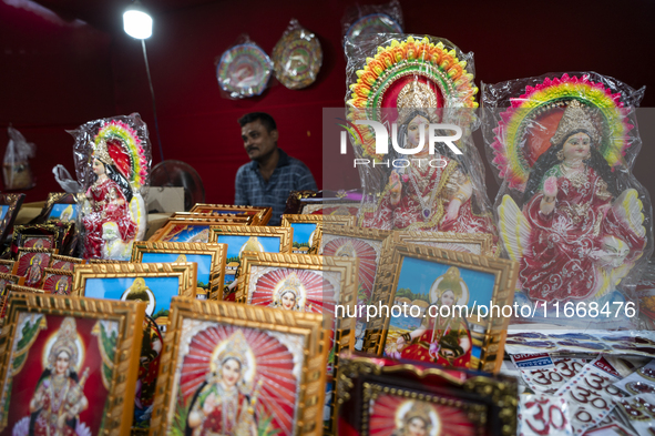 Lakshmi idols are displayed for sale on the eve of the Lakshmi Puja festival in Guwahati, India, on October 15, 2024. Laxmi is one of the mo...