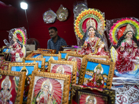 Lakshmi idols are displayed for sale on the eve of the Lakshmi Puja festival in Guwahati, India, on October 15, 2024. Laxmi is one of the mo...