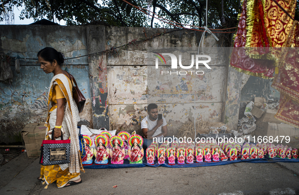 Lakshmi idols are displayed for sale on the eve of the Lakshmi Puja festival in Guwahati, India, on October 15, 2024. Laxmi is one of the mo...