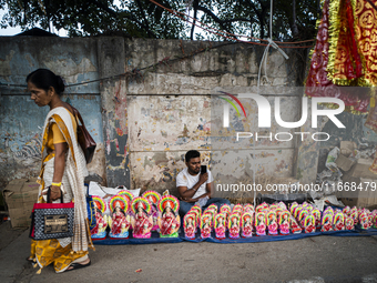 Lakshmi idols are displayed for sale on the eve of the Lakshmi Puja festival in Guwahati, India, on October 15, 2024. Laxmi is one of the mo...