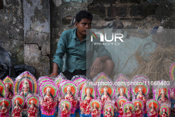 Lakshmi idols are displayed for sale on the eve of the Lakshmi Puja festival in Guwahati, India, on October 15, 2024. Laxmi is one of the mo...