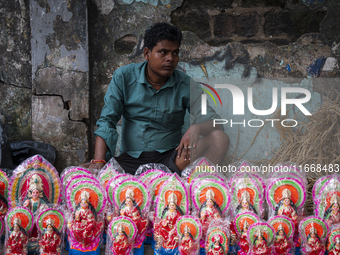 Lakshmi idols are displayed for sale on the eve of the Lakshmi Puja festival in Guwahati, India, on October 15, 2024. Laxmi is one of the mo...