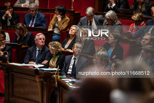 The government benches in parliament during question time. Premier Michel Barnier and Interior Minister Bruno Retailleau are visible in the...