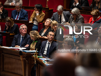 The government benches in parliament during question time. Premier Michel Barnier and Interior Minister Bruno Retailleau are visible in the...