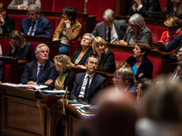 The government benches in parliament during question time. Premier Michel Barnier and Interior Minister Bruno Retailleau are visible in the...