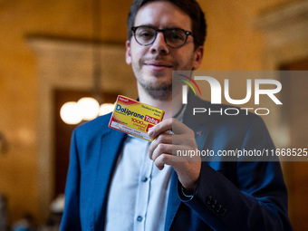 La France Insoumise deputy Hadrien Clouet shows a packet of Doliprane, the best-selling drug in France, at the center of controversy over th...