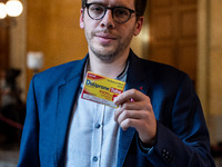 La France Insoumise deputy Hadrien Clouet shows a packet of Doliprane, the best-selling drug in France, at the center of controversy over th...