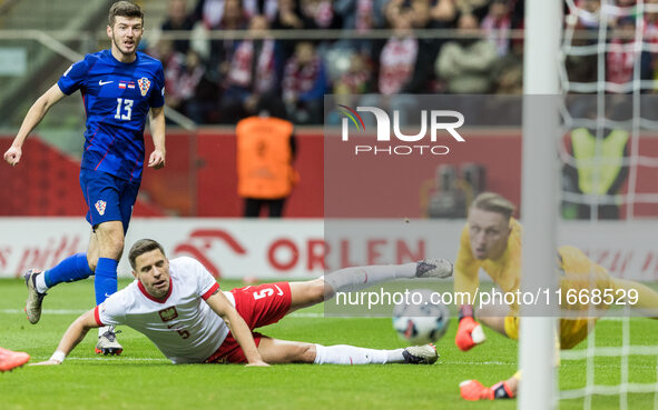 Petar Sucic  scores, Jan Bednarek , Marcin Bulka  during UEFA Nations League match Poland vs Croatia in Warsaw Poland on 15 October 2024. 