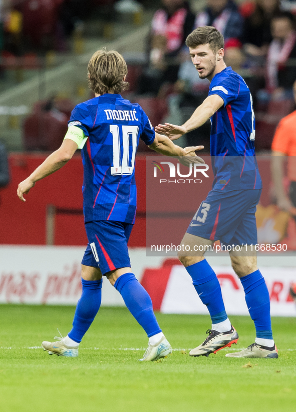 Luka Modric , Petar Sucic , goal celebration during UEFA Nations League match Poland vs Croatia in Warsaw Poland on 15 October 2024. 