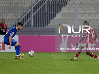 In Ta' Qali, Malta, on October 13, 2024, Basil Tuma of Malta is in action during the UEFA Nations League, League D, Group D2 soccer match be...