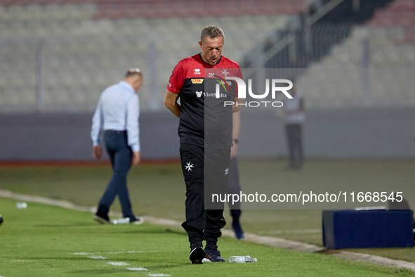 In Ta' Qali, Malta, on October 13, 2024, Davide Mazzotta, interim coach of Malta, gestures during the UEFA Nations League, League D, Group D...