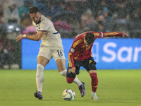 Strahinja Erakovic of Serbia battles for the ball during the UEFA Nations League 2024/25 League A Group A4 match between Spain and Serbia at...