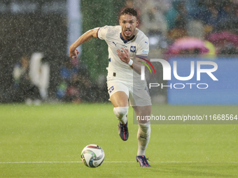 Strahinja Erakovic of Serbia runs with the ball during the UEFA Nations League 2024/25 League A Group A4 match between Spain and Serbia at N...