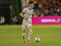 Kosta Nedeljkovic of Serbia runs with the ball during the UEFA Nations League 2024/25 League A Group A4 match between Spain and Serbia at Nu...