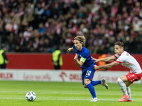 Luka Modric , Kacper Urbanski  during UEFA Nations League match Poland vs Croatia in Warsaw Poland on 15 October 2024. (