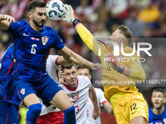 Josip Sutalo , Marcin Bulka  during UEFA Nations League match Poland vs Croatia in Warsaw Poland on 15 October 2024. (