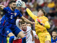 Josip Sutalo , Marcin Bulka  during UEFA Nations League match Poland vs Croatia in Warsaw Poland on 15 October 2024. (