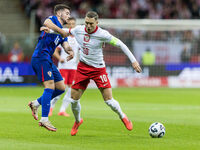 Martin Baturina , Piotr Zielinski  during UEFA Nations League match Poland vs Croatia in Warsaw Poland on 15 October 2024. (