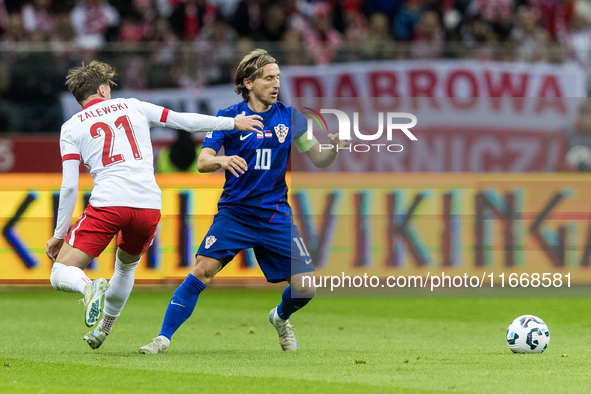 Nicola Zalewski , Luka Modric  during UEFA Nations League match Poland vs Croatia in Warsaw Poland on 15 October 2024. 