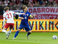 Nicola Zalewski , Luka Modric  during UEFA Nations League match Poland vs Croatia in Warsaw Poland on 15 October 2024. (