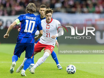 Luka Modric , Nicola Zalewski  during UEFA Nations League match Poland vs Croatia in Warsaw Poland on 15 October 2024. (