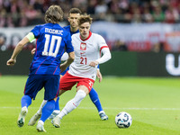 Luka Modric , Nicola Zalewski  during UEFA Nations League match Poland vs Croatia in Warsaw Poland on 15 October 2024. (