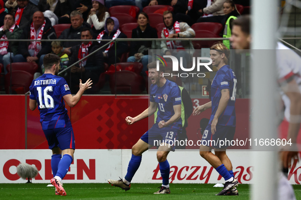 Martin Baturina and Petar Sucic of Croatia celebrate the goal during UEFA Nations League football match Poland - Croatia at National Stadium...