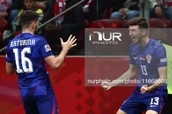 Martin Baturina and Petar Sucic of Croatia celebrate the goal during UEFA Nations League football match Poland - Croatia at National Stadium...