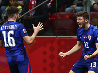 Martin Baturina and Petar Sucic of Croatia celebrate the goal during UEFA Nations League football match Poland - Croatia at National Stadium...