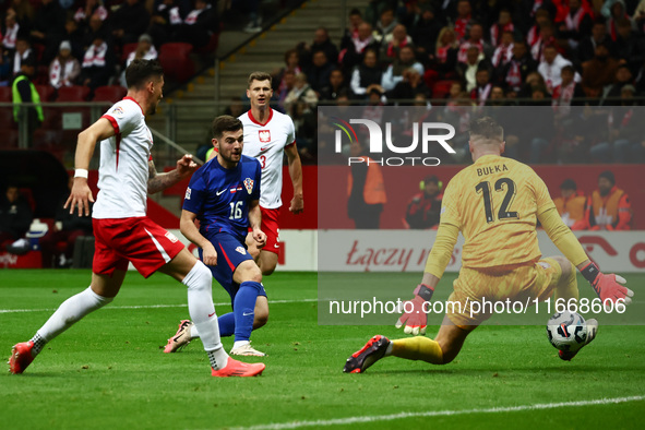 Martin Baturina of Croatia scores the goal during UEFA Nations League football match Poland - Croatia at National Stadium in Warsaw, Poland...