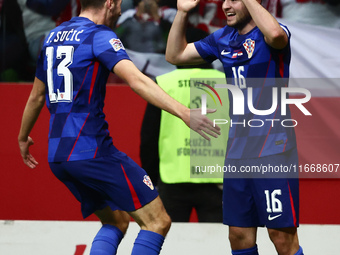 Petar Sucic and Martin Baturina of Croatia celebrate the goal during UEFA Nations League football match Poland - Croatia at National Stadium...