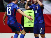 Petar Sucic and Martin Baturina of Croatia celebrate the goal during UEFA Nations League football match Poland - Croatia at National Stadium...