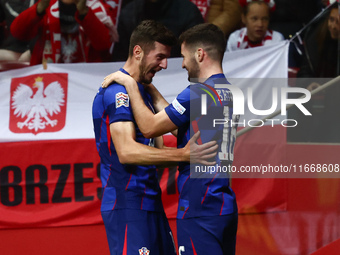 Petar Sucic and Martin Baturina of Croatia celebrate the goal during UEFA Nations League football match Poland - Croatia at National Stadium...