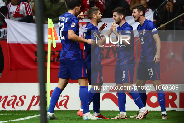 Petar Sucic and Martin Baturina of Croatia celebrate the goal during UEFA Nations League football match Poland - Croatia at National Stadium...