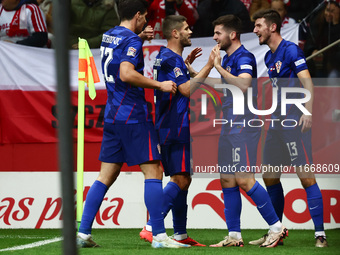 Petar Sucic and Martin Baturina of Croatia celebrate the goal during UEFA Nations League football match Poland - Croatia at National Stadium...