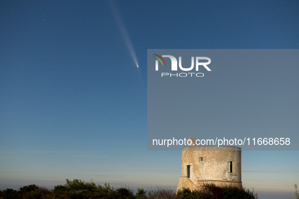 The comet Tsuchinshan-ATLAS (C/2023 A3) with a comet’s coma and anti-tail is seen over Torre del Pizzo, in Gallipoli, Italy, on October 15,...