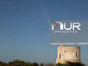 The comet Tsuchinshan-ATLAS (C/2023 A3) with a comet’s coma and anti-tail is seen over Torre del Pizzo, in Gallipoli, Italy, on October 15,...