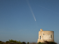 The comet Tsuchinshan-ATLAS (C/2023 A3) with a comet’s coma and anti-tail is seen over Torre del Pizzo, in Gallipoli, Italy, on October 15,...