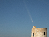 The comet Tsuchinshan-ATLAS (C/2023 A3) is seen over Torre del Pizzo, in Gallipoli, Italy, on October 15, 2024. The comet's coma, or head, m...