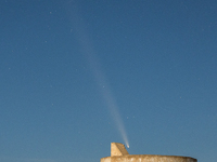 The comet Tsuchinshan-ATLAS (C/2023 A3) is seen over Torre del Pizzo, in Gallipoli, Italy, on October 15, 2024. The comet's coma, or head, m...