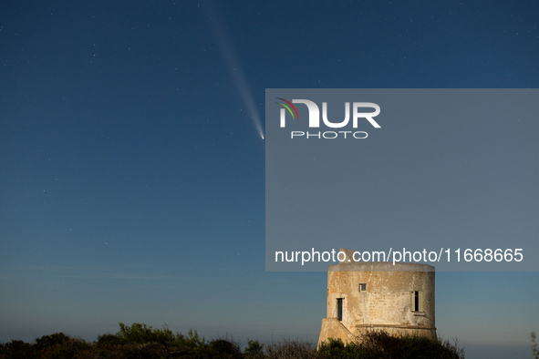 The comet Tsuchinshan-ATLAS (C/2023 A3) with a comet’s coma and anti-tail is seen over Torre del Pizzo, in Gallipoli, Italy, on October 15,...